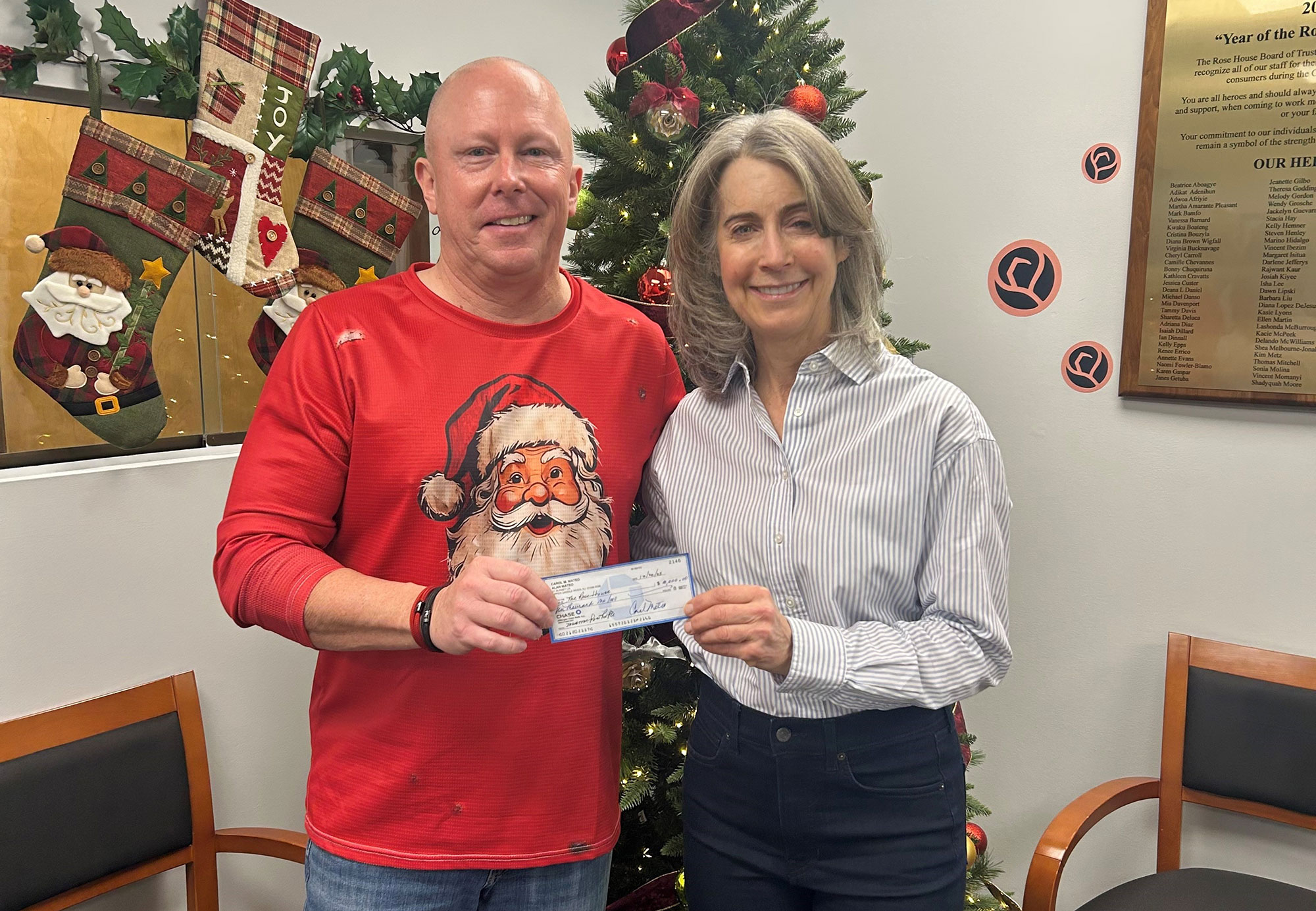 Carol Mateo won the Rose House 50-50 and donated $10,000 back!